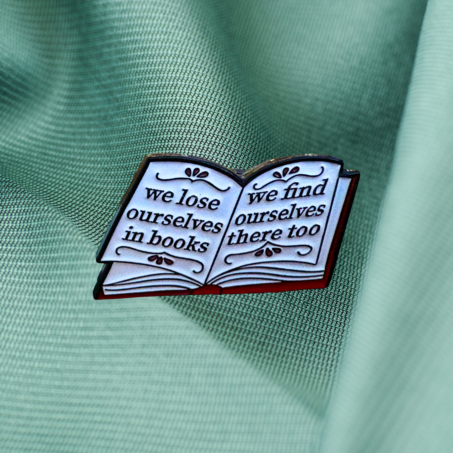 We Lose Ourselves in Books Pin
